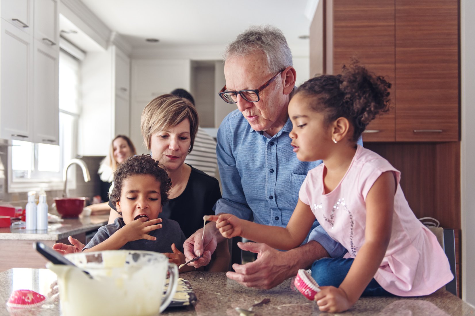 Grandparents cooking with kids